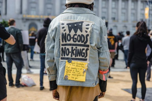 Photo by Jason Leunghttps://unsplash.com/photos/man-in-gray-and-black-long-sleeve-shirt-and-brown-pants-standing-on-street-during-daytime-7SRHI0BsO38