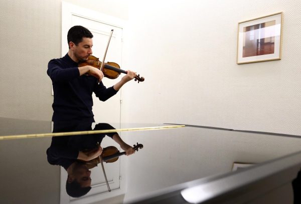 Armenian violinist Sergey Khachatryan plays a 300-year-old Stradivari violin, valued at around $16 million, before a rehearsal for a concert with the Belgian National Opera in Brussels, Belgium, October 16, 2025. REUTERS/Yves Herman
